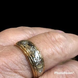 Man’s 14k gold band with four diamond chips
